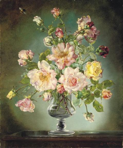 Pink, red and yellow roses in a glass vase