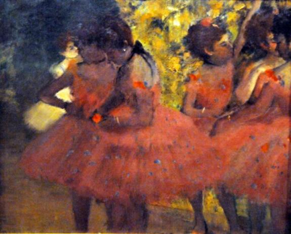 Dancers In Red Skirts