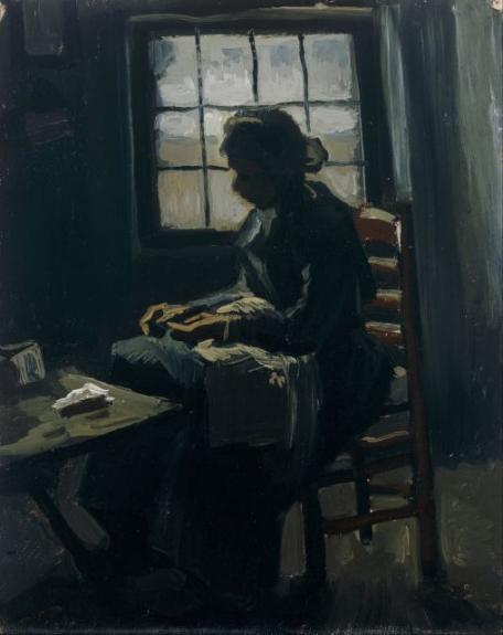 Woman Sewing.